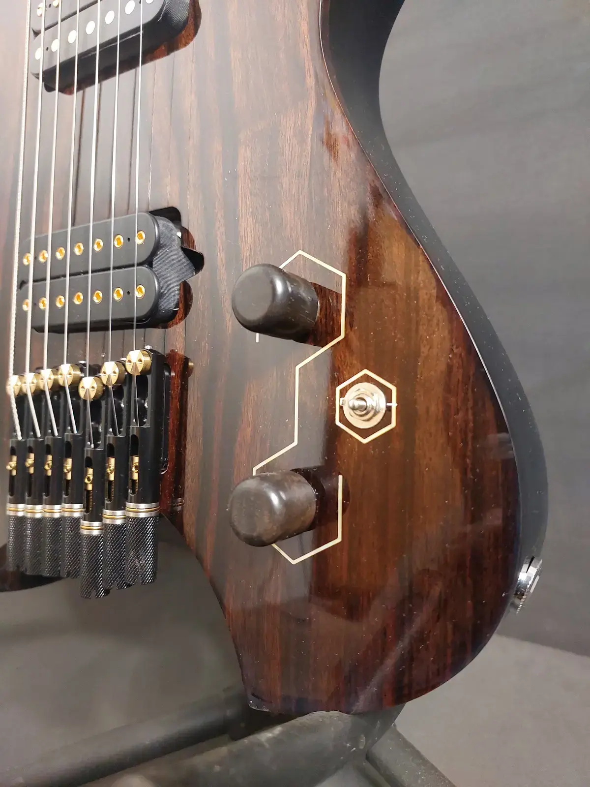 Nava Tabare controls with hexagon inlay detail